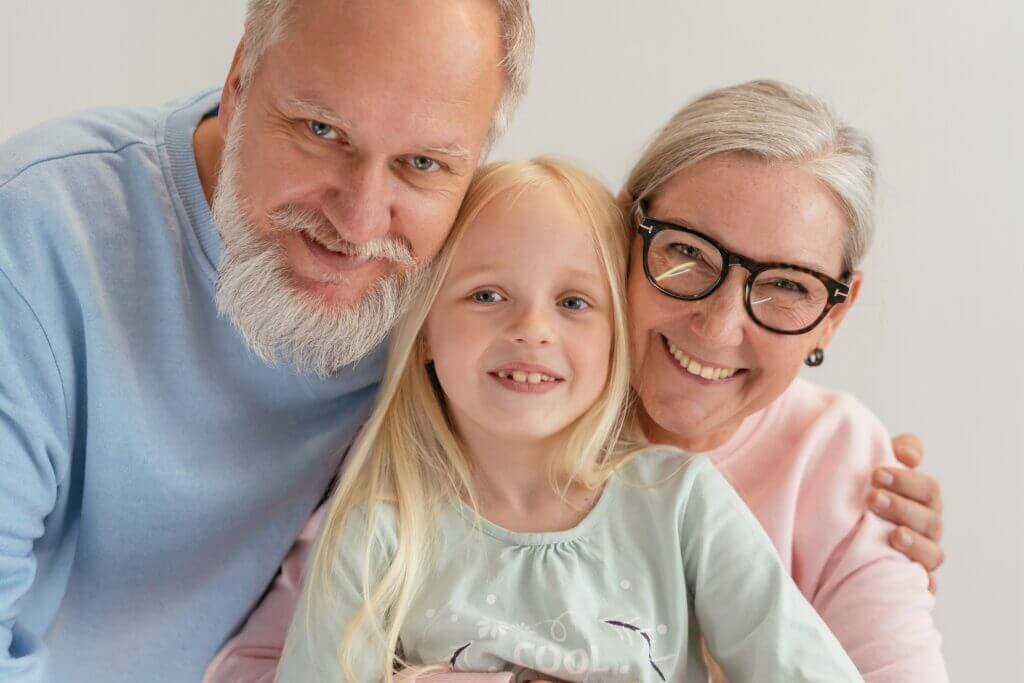 happy old couple with a little girl alzheimer's study