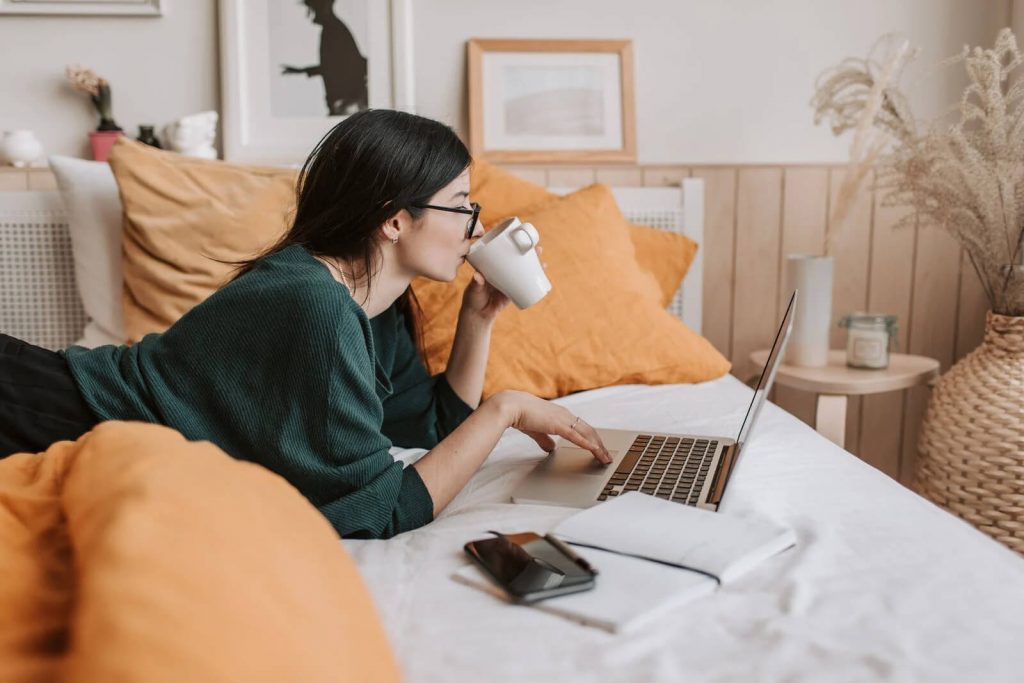 woman lying down drinking coffee ms clinical research