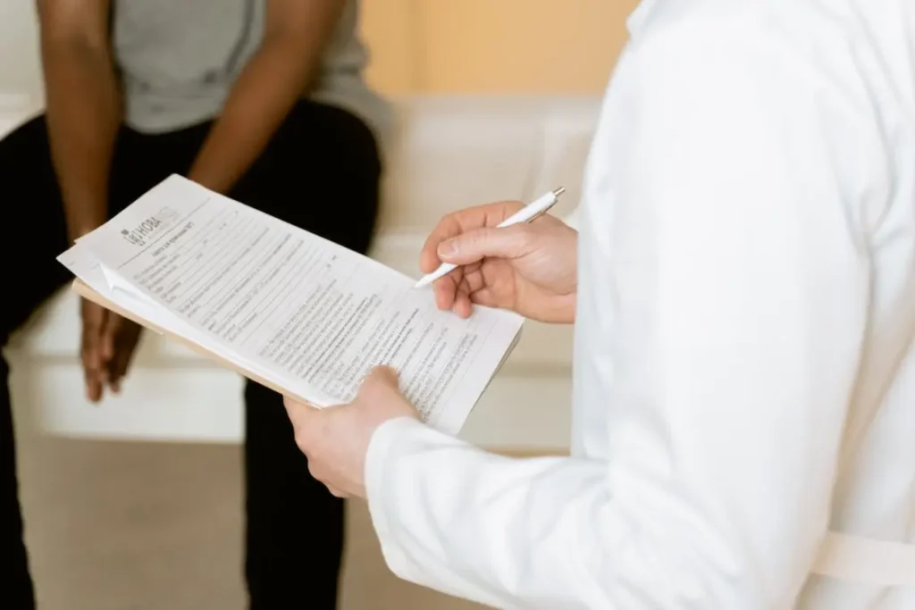 Doctor advising a patient with multiple sclerosis